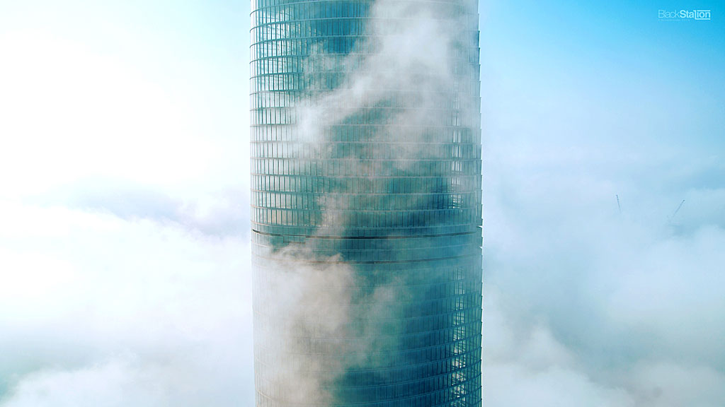 A tall glass building.