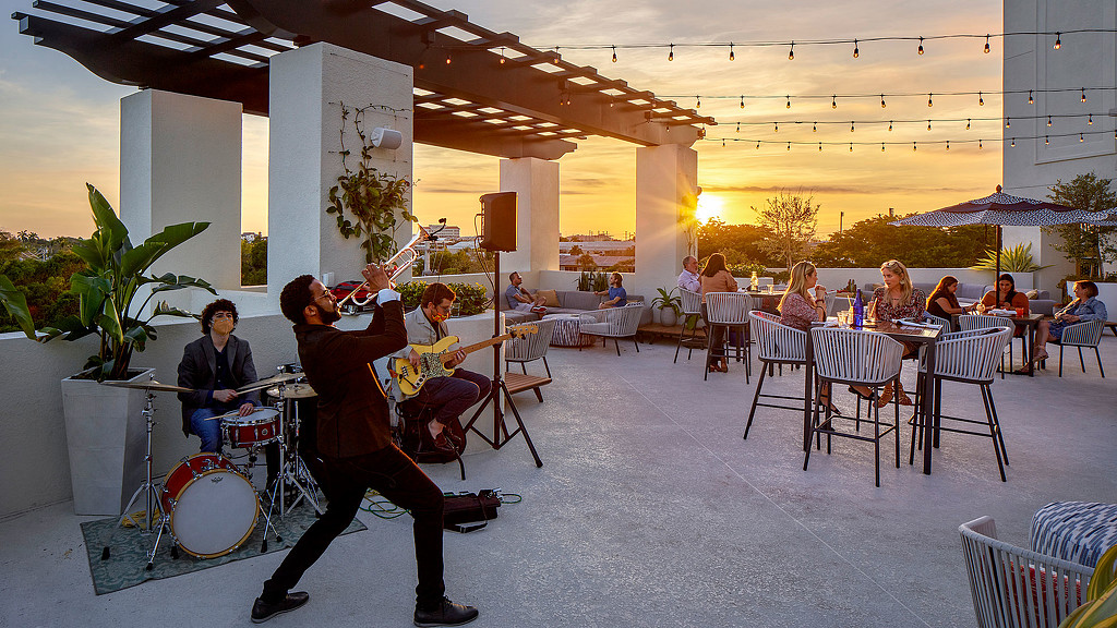 A group of people playing instruments.