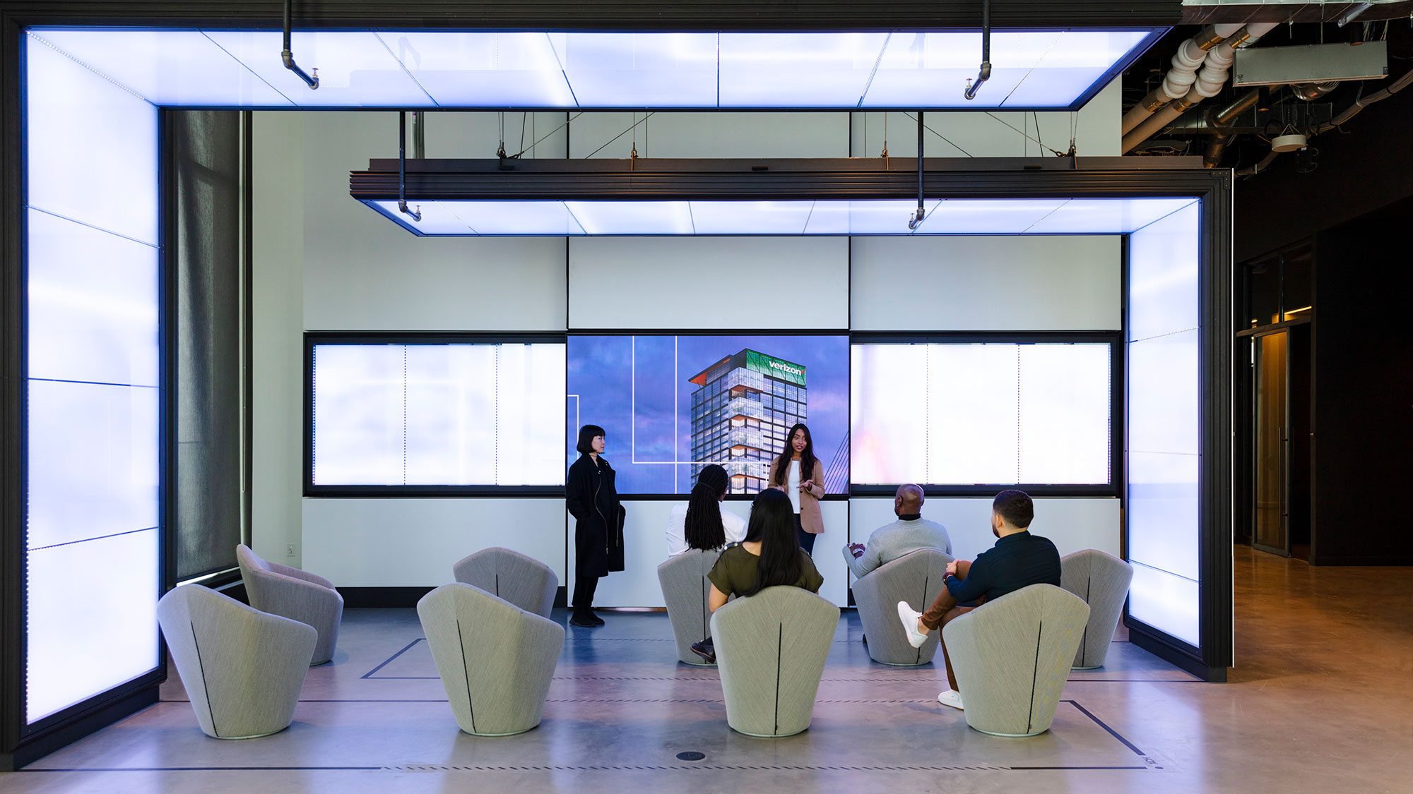 A group of people in a room.
